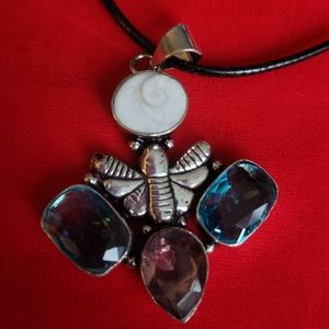 Unique shiva stone with amethyst and blue topaz set in sterling silver